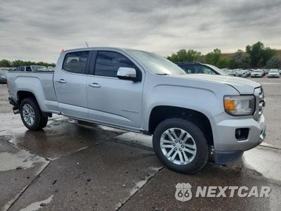 Czwarte zdjęcie samochodu z boku: 2016 GMC CANYON SLT VIN:1GTP6DE14G1234250 - miniatura
