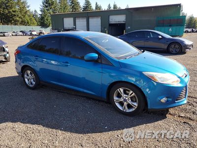 Czwarte zdjęcie samochodu z boku: 2012 FORD FOCUS SE VIN:1FAHP3F29CL320970 - miniatura