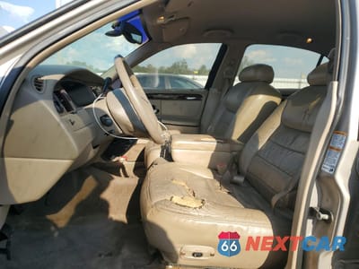 Zdjęcie 7 z 12 samochodu: 2000 LINCOLN TOWN CAR SIGNATURE VIN:1LNHM82WXYY770304 - miniatura