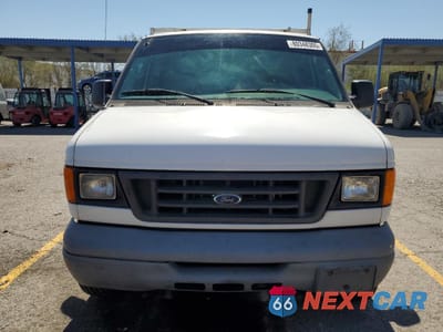 Piąte zdjęcie samochodu w środku: 2004 FORD ECONOLINE E350 SUPER DUTY VAN VIN:1FTSE34L24HB42681 - miniatura