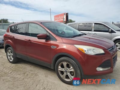 Czwarte zdjęcie samochodu z boku: 2014 FORD ESCAPE SE VIN:1FMCU9GX1EUB25822 - miniatura
