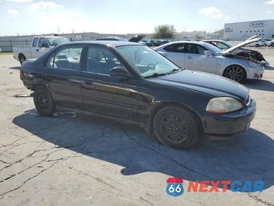 Czwarte zdjęcie samochodu z boku: 1997 HONDA CIVIC LX VIN:2HGEJ6678VH536130 - miniatura