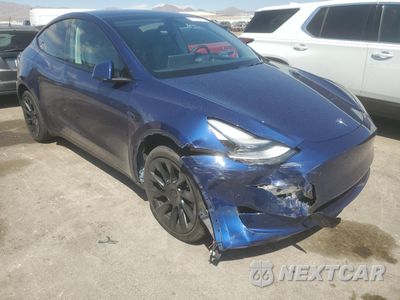 Czwarte zdjęcie samochodu z boku: 2023 TESLA MODEL Y VIN:7SAYGDEE9PF666346 - miniatura