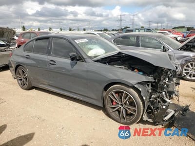 Czwarte zdjęcie samochodu z boku: 2024 BMW 330XI VIN:3MW89FF05R8E47782 - miniatura