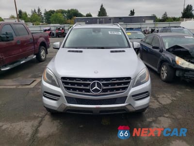 Piąte zdjęcie samochodu w środku: 2013 MERCEDES-BENZ ML 350 BLUETEC VIN:4JGDA2EB1DA157214 - miniatura