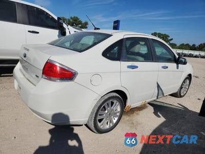 Trzecie zdjęcie samochodu z tyłu: 2010 FORD FOCUS SEL VIN:1FAHP3HN1AW165866 - miniatura