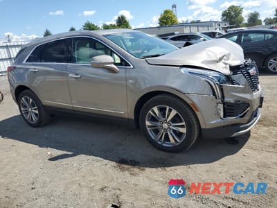 Czwarte zdjęcie samochodu z boku: 2022 CADILLAC XT5 PREMIUM LUXURY VIN:1GYKNDR49NZ137300 - miniatura