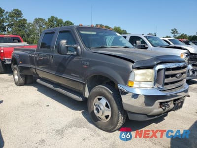 Czwarte zdjęcie samochodu z boku: 2002 FORD F350 SUPER DUTY VIN:1FTWW33F52EC78716 - miniatura