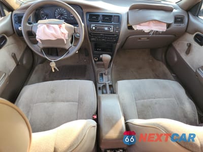 Zdjęcie 8 z 15 samochodu: 1996 TOYOTA COROLLA VIN:1NXBA02E7TZ426176 - miniatura