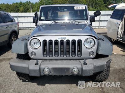 Piąte zdjęcie samochodu w środku: 2015 JEEP WRANGLER UNLIMITED SPORT VIN:1C4BJWDG0FL767306 - miniatura