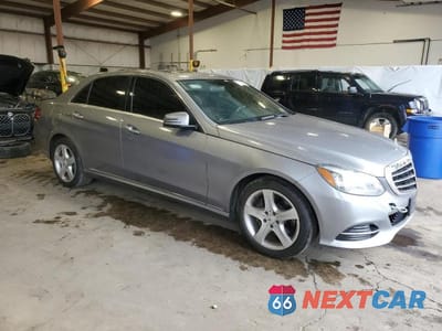 Czwarte zdjęcie samochodu z boku: 2014 MERCEDES-BENZ E 350 4MATIC VIN:WDDHF8JB2EB045927 - miniatura