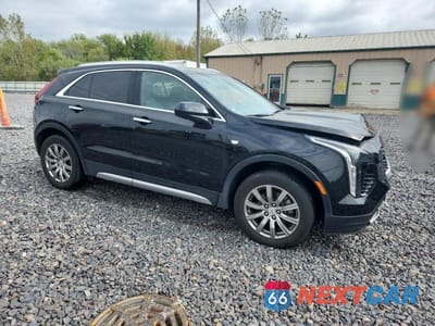 Czwarte zdjęcie samochodu z boku: 2019 CADILLAC XT4 PREMIUM LUXURY VIN:1GYFZDR46KF166918 - miniatura