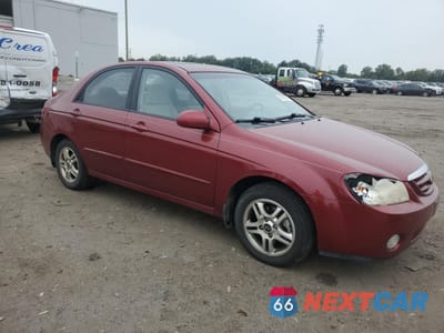 Czwarte zdjęcie samochodu z boku: 2005 KIA SPECTRA LX VIN:KNAFE121555134114 - miniatura