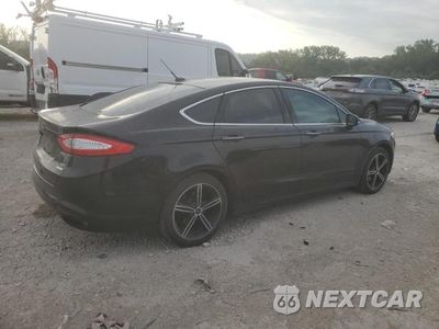 Trzecie zdjęcie samochodu z tyłu: 2016 FORD FUSION SE VIN:3FA6P0H92GR245388 - miniatura