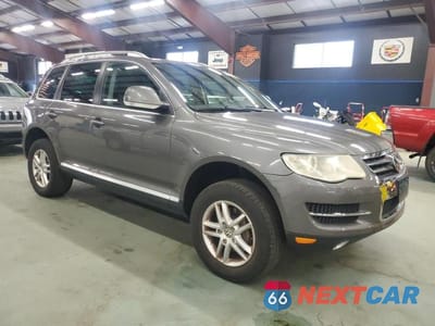 Czwarte zdjęcie samochodu z boku: 2009 VOLKSWAGEN TOUAREG 2 V6 VIN:WVGBE77L19D012372 - miniatura