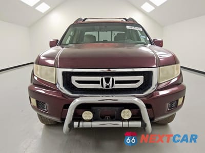 Piąte zdjęcie samochodu w środku: 2011 HONDA RIDGELINE RTS VIN:5FPYK1F47BB006354 - miniatura