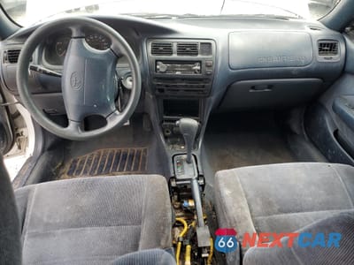 Zdjęcie 8 z 14 samochodu: 1994 TOYOTA COROLLA LE VIN:1NXAE09B7RZ196711 - miniatura