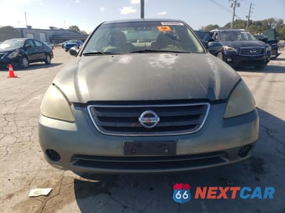 Piąte zdjęcie samochodu w środku: 2004 NISSAN ALTIMA BASE VIN:1N4AL11D94C180026 - miniatura