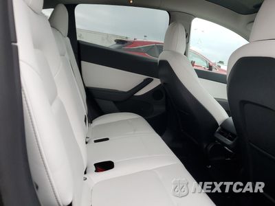 Zdjęcie 11 z 13 samochodu: 2022 TESLA MODEL Y VIN:7SAYGDEE8NF417629 - miniatura