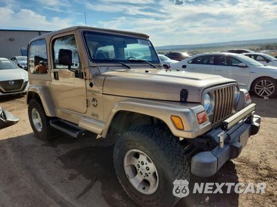 Czwarte zdjęcie samochodu z boku: 2000 JEEP WRANGLER / TJ SAHARA VIN:1J4FA59S1YP722244 - miniatura