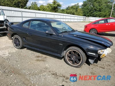 Czwarte zdjęcie samochodu z boku: 1996 FORD MUSTANG GT VIN:1FALP42X8TF107945 - miniatura