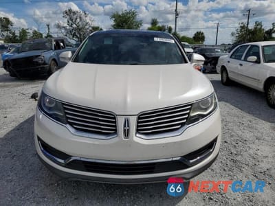 Piąte zdjęcie samochodu w środku: 2016 LINCOLN MKX RESERVE VIN:2LMTJ6LR9GBL75904 - miniatura