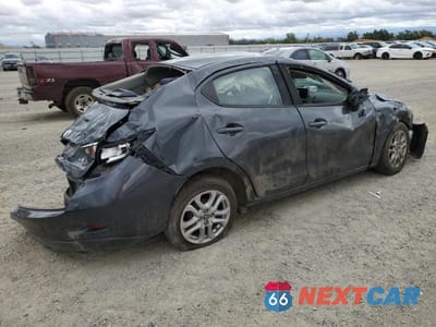 Trzecie zdjęcie samochodu z tyłu: 2017 TOYOTA YARIS IA BASE VIN:3MYDLBYV2HY165295 - miniatura