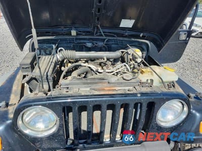 Zdjęcie 11 z 12 samochodu: 2004 JEEP WRANGLER / TJ SPORT VIN:1J4FA49S14P757130 - miniatura