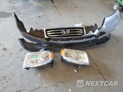 Zdjęcie 13 z 14 samochodu: 2012 HONDA PILOT TOURING VIN:5FNYF3H92CB024327 - miniatura