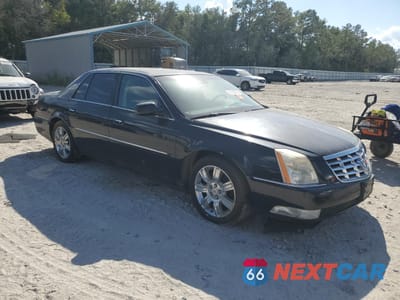 Czwarte zdjęcie samochodu z boku: 2010 CADILLAC DTS PLATINUM VIN:1G6KP5E9XAU120393 - miniatura