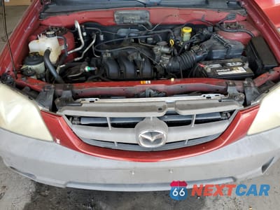 Zdjęcie 12 z 16 samochodu: 2001 MAZDA TRIBUTE DX VIN:4F2YU06191KM42739 - miniatura