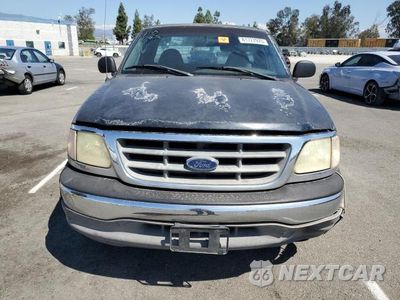 Piąte zdjęcie samochodu w środku: 2003 FORD F150 VIN:2FTRF17243CA69886 - miniatura