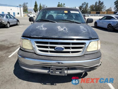 Piąte zdjęcie samochodu w środku: 2003 FORD F150 VIN:2FTRF17243CA69886 - miniatura