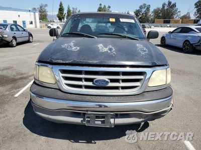 Piąte zdjęcie samochodu w środku: 2003 FORD F150 VIN:2FTRF17243CA69886 - miniatura