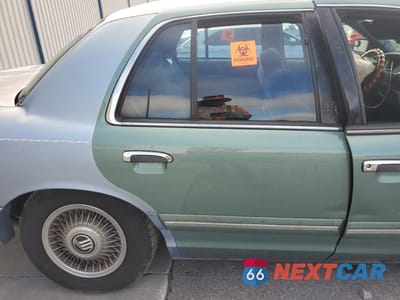 Zdjęcie 10 z 13 samochodu: 1997 MERCURY GRAND MARQUIS GS VIN:2MELM74W7VX716846 - miniatura