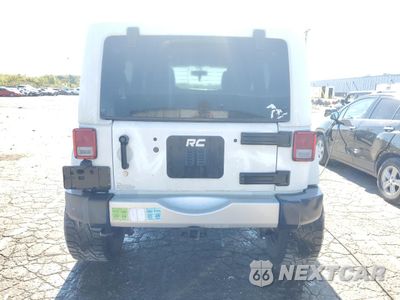 Zdjęcie 6 z 15 samochodu: 2013 JEEP WRANGLER UNLIMITED SAHARA VIN:1C4BJWEG4DL537747 - miniatura