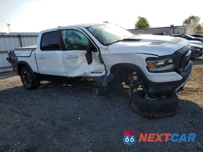 Czwarte zdjęcie samochodu z boku: 2021 RAM 1500 REBEL VIN:1C6SRFLTXMN533609 - miniatura