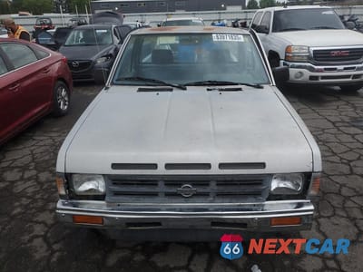 Piąte zdjęcie samochodu w środku: 1991 NISSAN TRUCK SHORT WHEELBASE VIN:1N6SD11SXMC311083 - miniatura