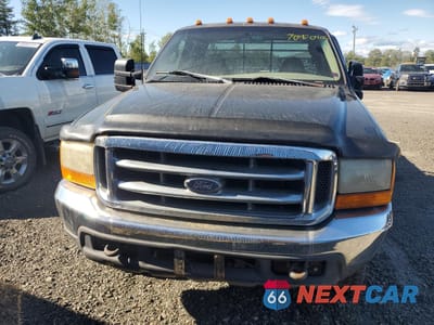 Piąte zdjęcie samochodu w środku: 1999 FORD F350 SUPER DUTY VIN:1FTWX33F3XEA32140 - miniatura