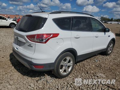 Trzecie zdjęcie samochodu z tyłu: 2014 FORD ESCAPE SE VIN:1FMCU0GX3EUA53940 - miniatura
