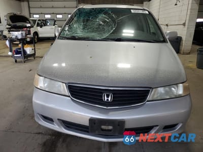 Piąte zdjęcie samochodu w środku: 2001 HONDA ODYSSEY EX VIN:2HKRL18641H608279 - miniatura