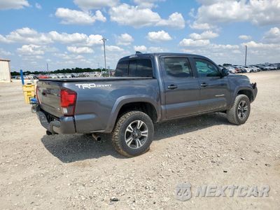 Trzecie zdjęcie samochodu z tyłu: 2019 TOYOTA TACOMA DOUBLE CAB VIN:3TMAZ5CN1KM098471 - miniatura