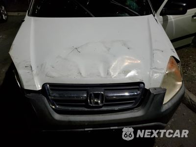 Zdjęcie 12 z 13 samochodu: 2002 HONDA CR-V LX VIN:JHLRD68402C001854 - miniatura
