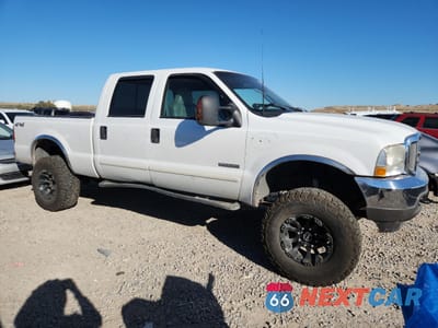Czwarte zdjęcie samochodu z boku: 2003 FORD F350 SRW SUPER DUTY VIN:1FTSW31P03EC88064 - miniatura