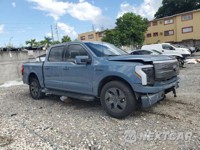 Czwarte zdjęcie samochodu z boku: 2023 FORD F150 LIGHTNING PRO VIN:1FTVW1EV9PWG26295 - miniatura