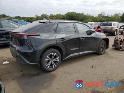 Trzecie zdjęcie samochodu z tyłu: 2024 TOYOTA BZ4X XLE VIN:JTMABACA2RA079994 - miniatura