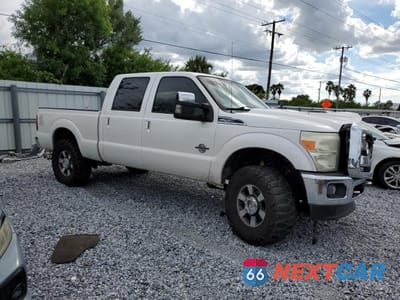 Czwarte zdjęcie samochodu z boku: 2011 FORD F250 SUPER DUTY VIN:1FT7W2BT9BEC67675 - miniatura