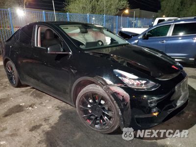 Czwarte zdjęcie samochodu z boku: 2021 TESLA MODEL Y VIN:5YJYGDEE6MF137199 - miniatura
