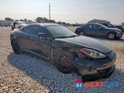 Czwarte zdjęcie samochodu z boku: 2007 HYUNDAI TIBURON GS VIN:KMHHM66D27U236264 - miniatura