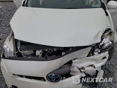 Zdjęcie 12 z 13 samochodu: 2015 TOYOTA PRIUS VIN:JTDKN3DUXF2000531 - miniatura